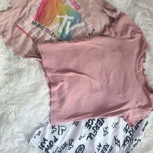 Colorful bundle of size ten kids tee shirts.